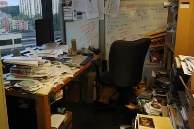 Desk with half-finished projects - Photo by Wonderlane on Unsplash