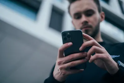 Person turning away from phone distraction - Photo by Jonas Leupe on Unsplash