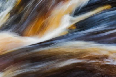 A still stream of water — Photo by Dave Hoefler on Unsplash