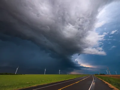 Storm clouds clearing over a path forward — Photo by Raychel Sanner on Unsplash