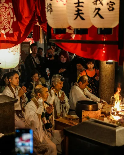 People gathered for Japanese religious ceremony with lanterns