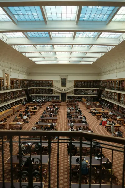 Library interior with towering bookshelves - Photo by Dominic Kurniawan Suryaputra on Unsplash