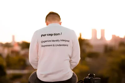 Person in quiet contemplation near camera equipment - Photo by Bradley Pisney on Unsplash