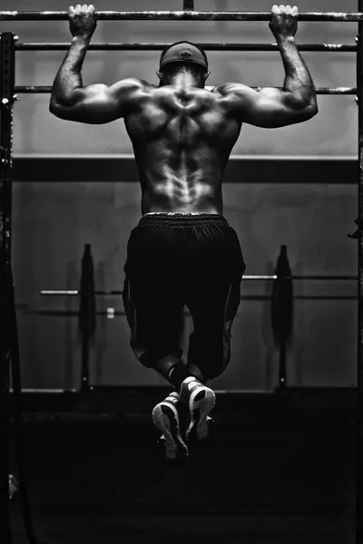 Weight lifter preparing to lift — Photo by Edgar Chaparro on Unsplash
