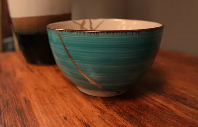 Kintsugi pottery with gold repair