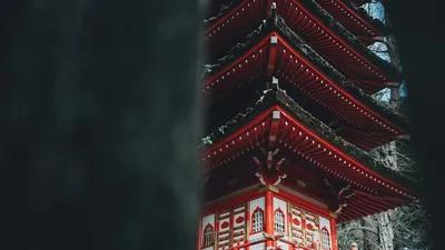 Red pagoda temple standing serene against the sky
