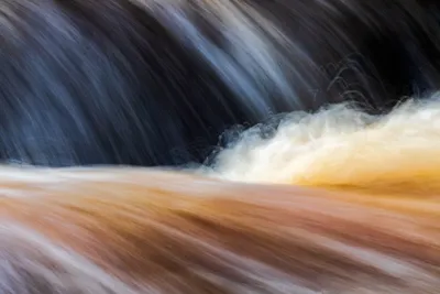Flowing water — Photo by Dave Hoefler on Unsplash