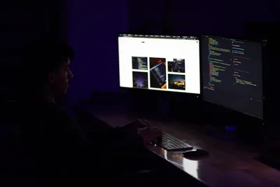 Developer coding on computer — Photo by Mohammad Rahmani on Unsplash