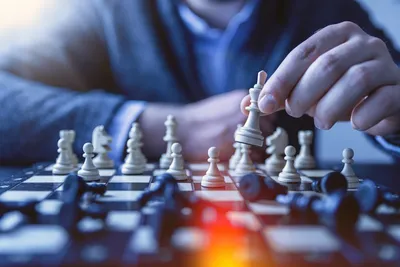 Man playing chess — Photo by JESHOOTS.COM on Unsplash