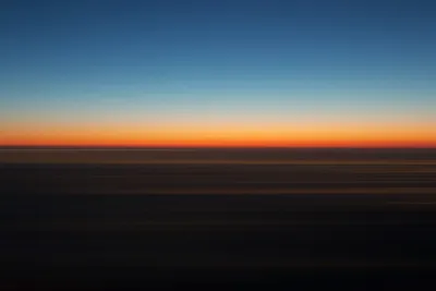 Sunrise over horizon — Photo by Luke Moss on Unsplash